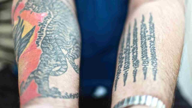 Hình xăm 5 dòng bùa thái ở bắp tay... - Đỗ Nhân Tattoo Studio | Facebook