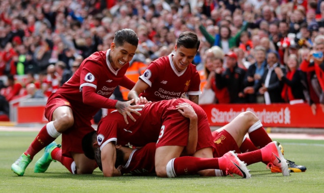 Liverpool,  Arsenal tranh ve du Champions Leagu anh 27